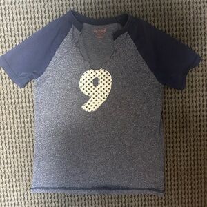 “9” baby tee